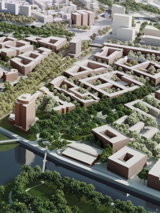 Eine Vogelperspektive auf die Stadt zeigt zahlreiche Gebäude, die die dichte Bebauung und die städtische Landschaft veranschaulichen. Die Anordnung der Gebäude vermittelt ein klares Bild der urbanen Struktur.